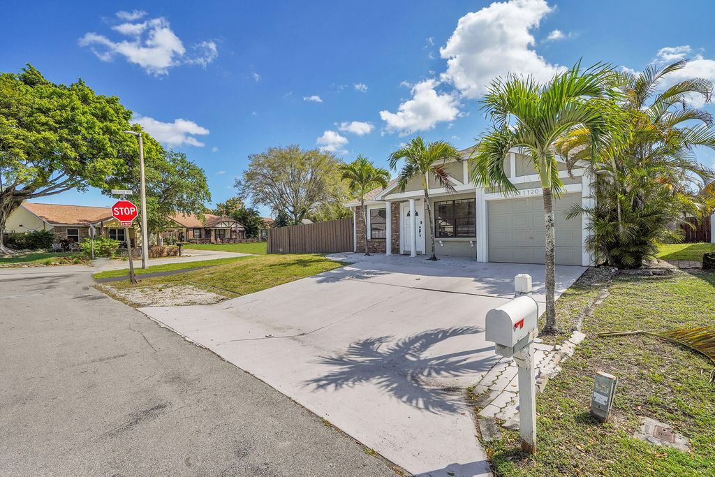 Photo of 11120 N Terradas Lane, Boca Raton, FL 33428 (MLS # R11068523)