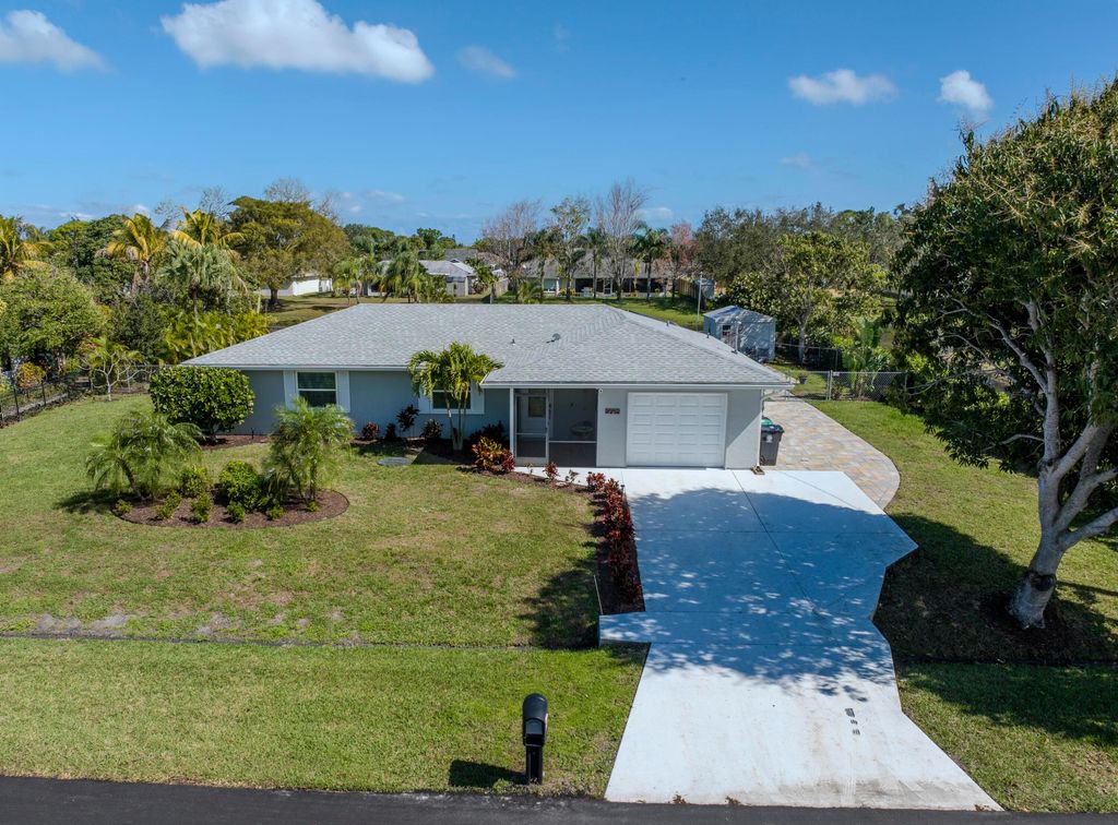 Photo of 2513 SE Hallahan Street, Port Saint Lucie, FL 34952 (MLS # B26034990)