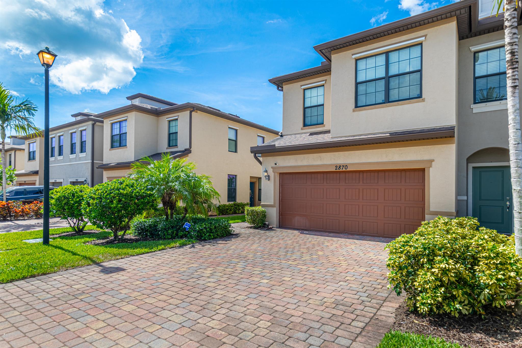 Modern 3BD/2.5BA townhome in the desirable Preston Square community of West Palm Beach. Featuring an open-concept main level with a spacious living area, dining space, and classic contemporary kitchen with stainless steel appliances. Upstairs offers a private primary suite with custom made walk-in closet, two guest bedrooms, and two full baths. Enjoy a 2 car garage, in-unit laundry, and a private patio. Community amenities include a pool, playground, and walking paths. Conveniently located near shopping, dining, major highways, and just minutes from downtown West Palm Beach.
