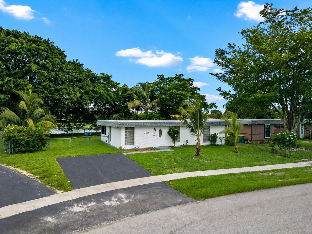 Photo of 6807 NW 80TH Court, Tamarac, FL 33321 (MLS # B26073849)