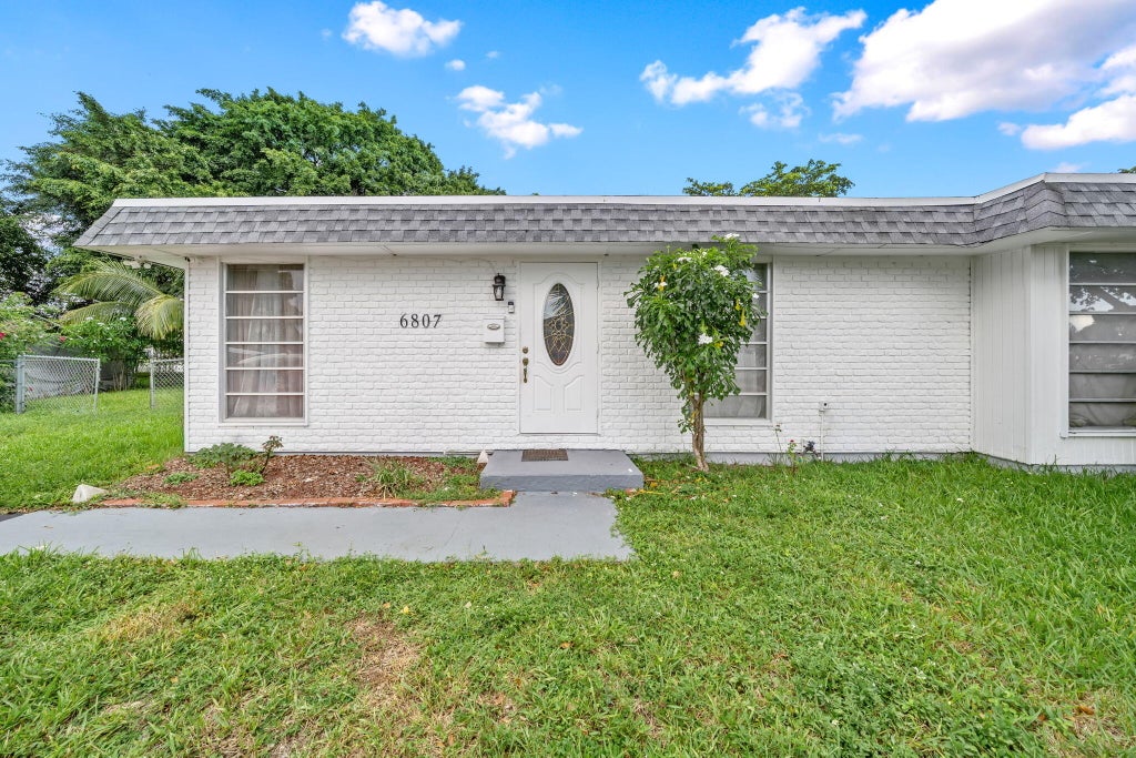 Photo of 6807 NW 80TH Court, Tamarac, FL 33321 (MLS # B26073849)
