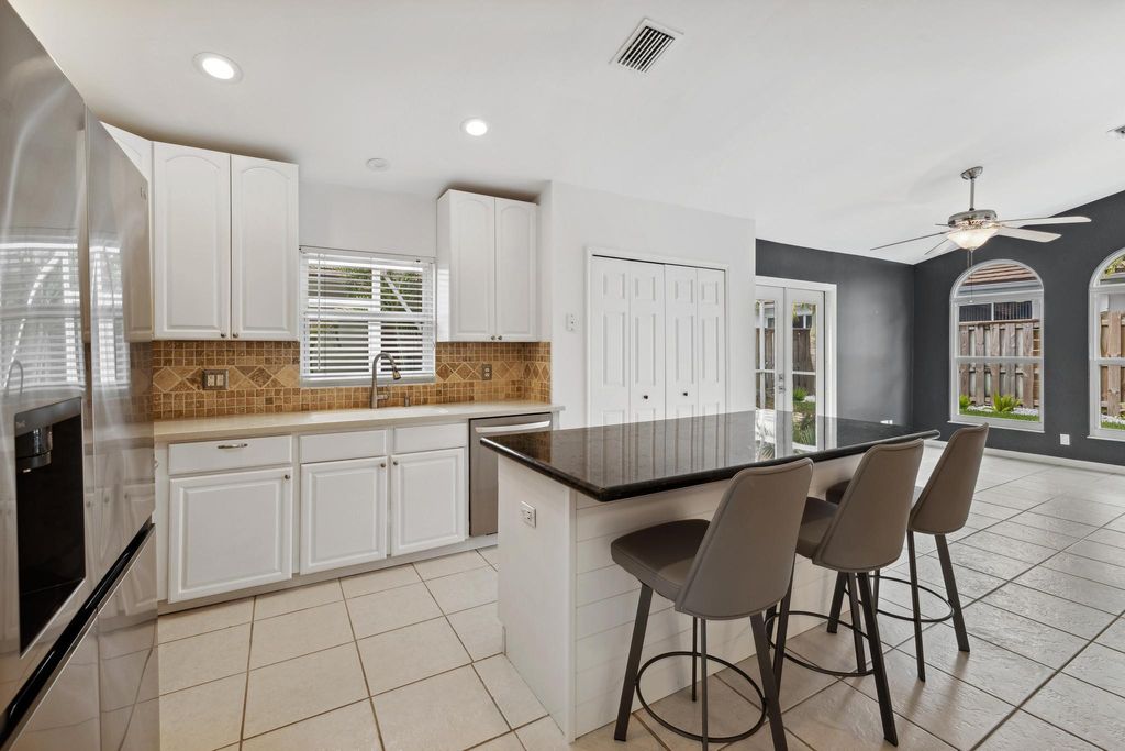 Photo of 133 St Michaels Court, Jupiter, FL 33458 (MLS # R10975913)