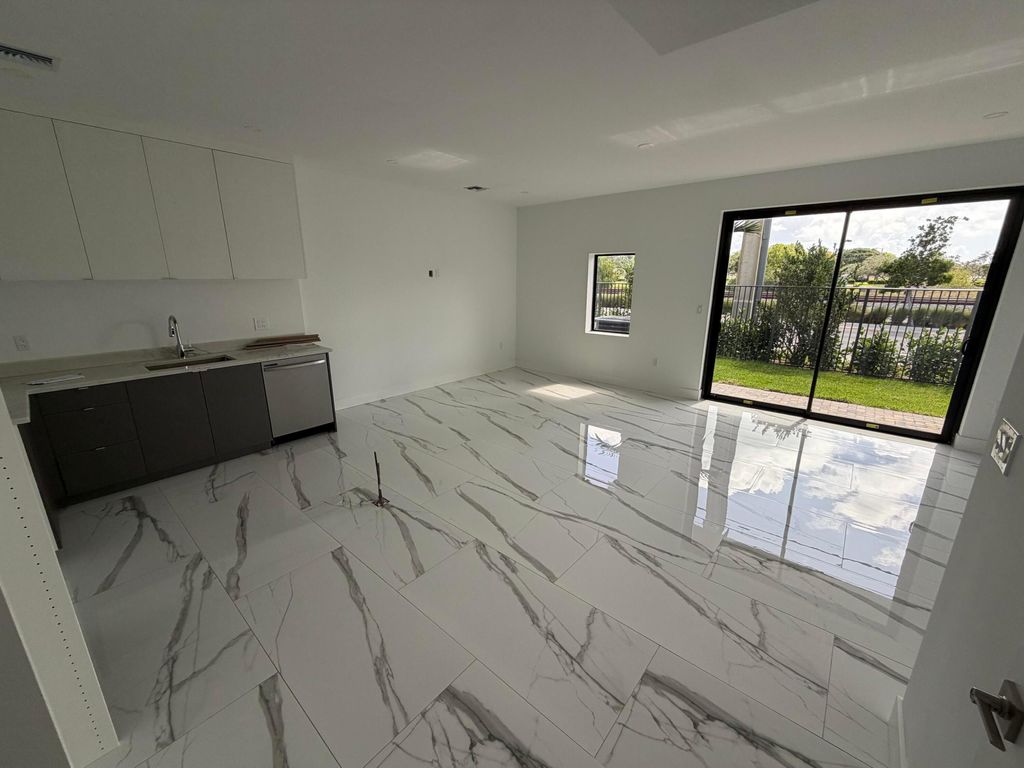 Photo of 110 NW 15th Court, Pompano Beach, FL 33060 (MLS # B26014018)