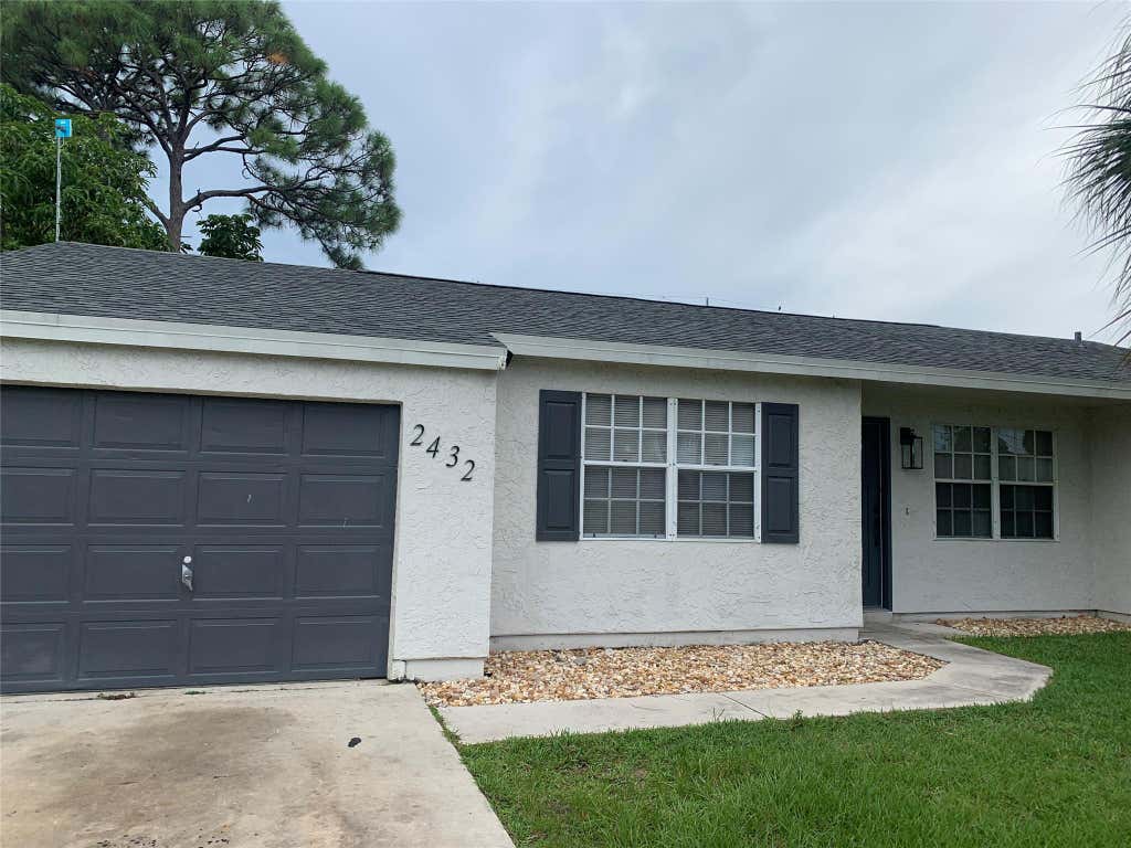 Photo of 2432 SE Richmond Street, Port Saint Lucie, FL 34952 (MLS # F10491091)