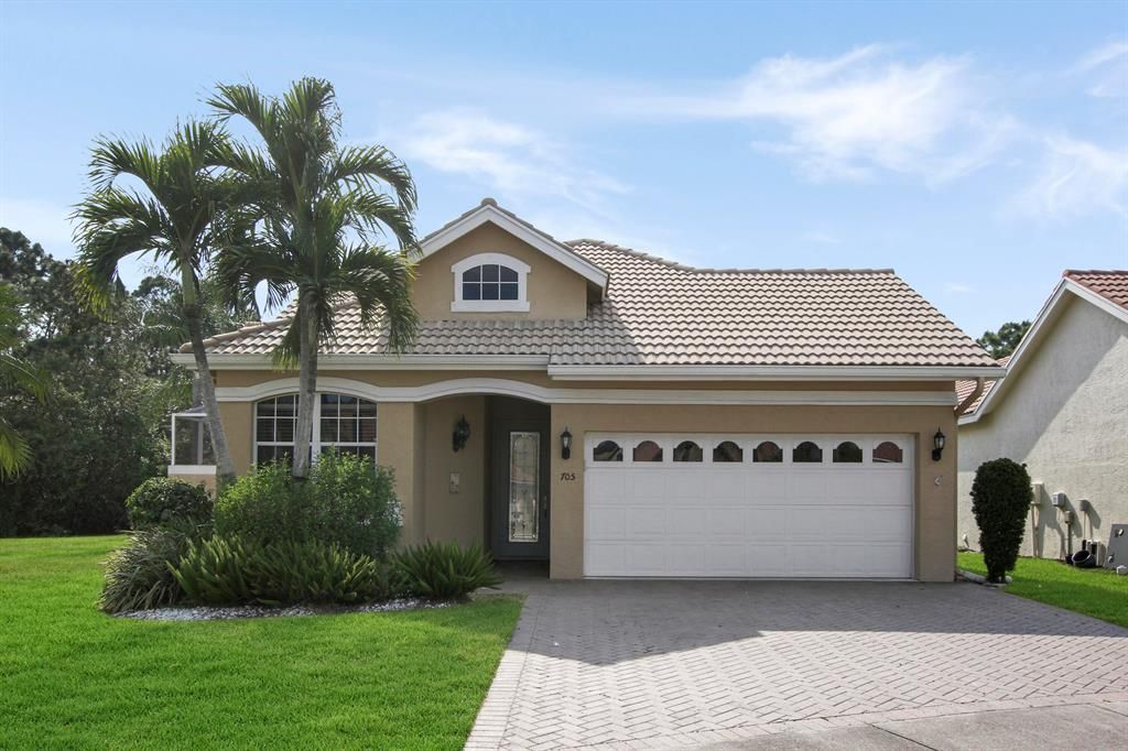 Photo of 705 SW Andros Cove, Port St Lucie, FL 34986 (MLS # R10874958)