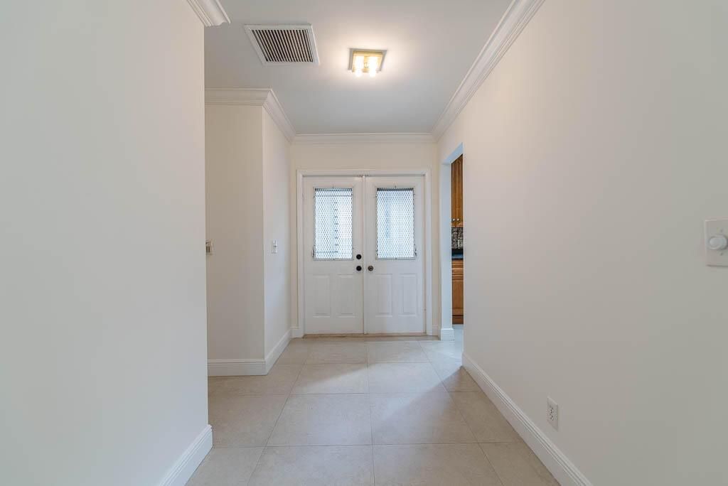 Photo of 9120 Pine Springs Drive, Boca Raton, FL 33428 (MLS # R11060921)