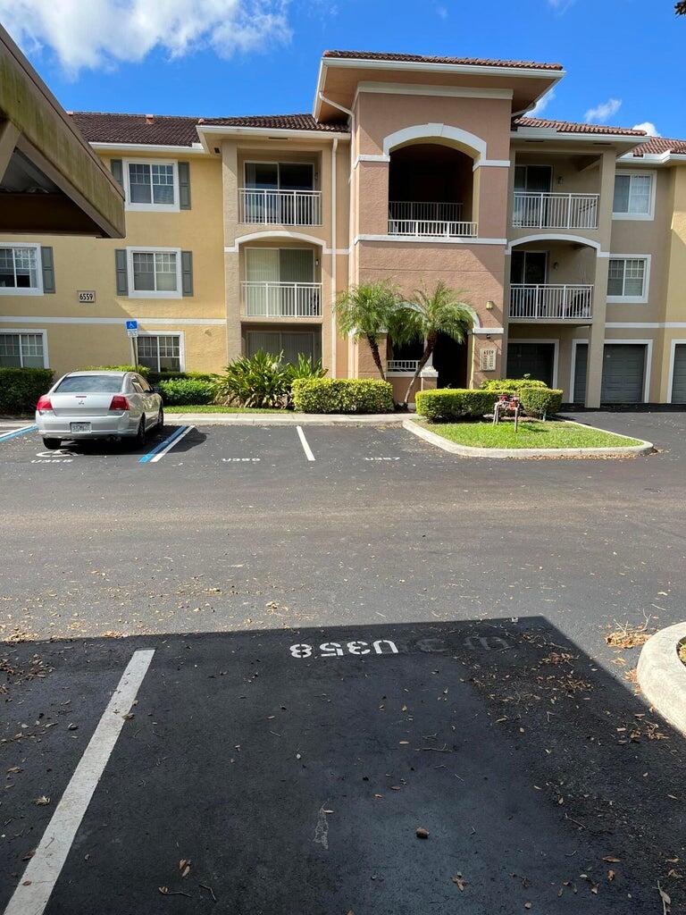 Photo of 6559 Emerald Dunes Drive #103, West Palm Beach, FL 33411 (MLS # R11037707)