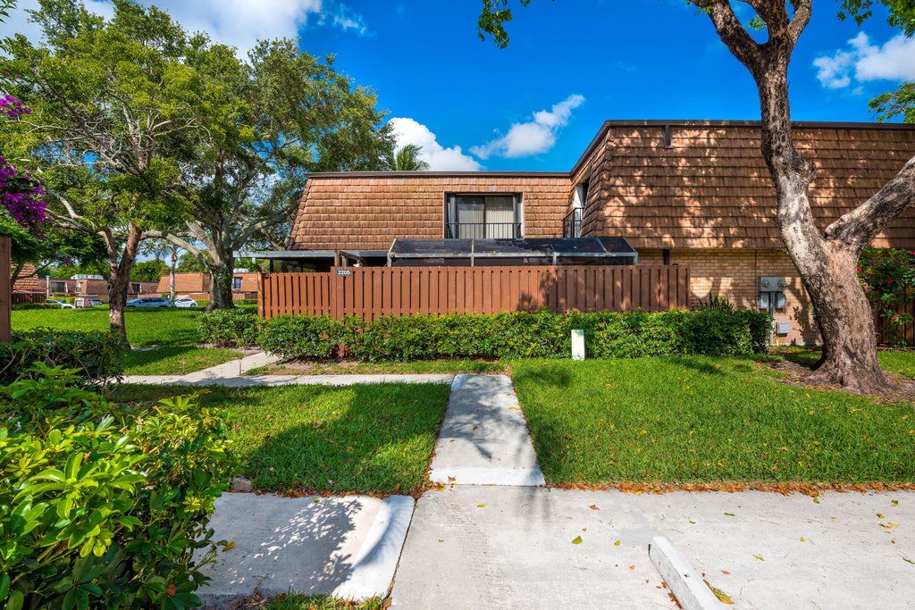 Photo of 2205 22nd Lane, Greenacres, FL 33463 (MLS # B26077063)