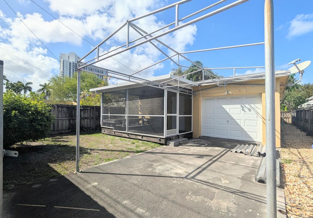 Photo of 1626 Tyler Street, Hollywood, FL 33020 (MLS # B26002038)