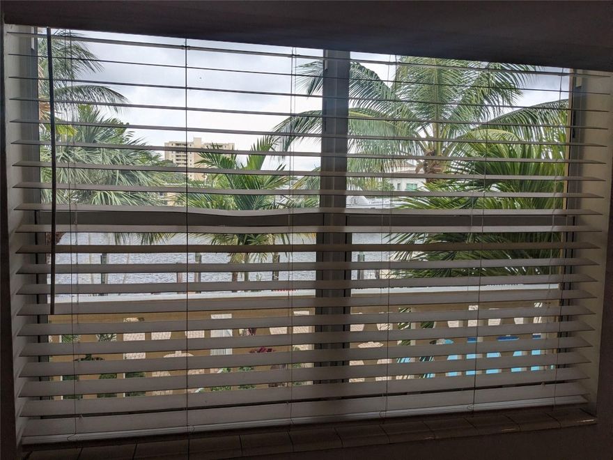 Middle River Villas, a boutique waterfront complex directly on the Middle River in Coral Ridge. This second floor 1/1 corner unit has beautiful views of the river and pool. Located by Galleria Mall and walking distance to beaches. Move-in condition. Freshly painted. Walk-in closet. Located in close proximity to stairs and laundry room. Elevator access in addition to stairs. Nicely maintained complex. Pet friendly. Rental friendly. Docks for rent when available. One assigned parking space. Bayview Elementary/Sunrise Middle/Ft Lauderdale High district.