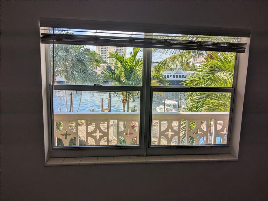 Middle River Villas, a boutique waterfront complex directly on the Middle River in Coral Ridge. This second floor 1/1 corner unit has beautiful views of the river and pool. Located by Galleria Mall and walking distance to beaches. Move-in condition. Freshly painted. Walk-in closet. Located in close proximity to stairs and laundry room. Elevator access in addition to stairs. Nicely maintained complex. Pet friendly. Rental friendly. Docks for rent when available. One assigned parking space. Bayview Elementary/Sunrise Middle/Ft Lauderdale High district.