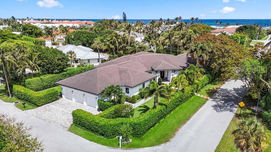 Coastal modern estate home in rarely available beachside enclave. East of A1A with deeded beach access. Totally new and completely renovated in 2020 the  home exudes casual elegance. The single story residence is situated on 1/2+ acre corner lot with over 6,500 square feet of living space. Spacious, open, airy and bright with 5 Bedrooms, 5.1 Baths, no detail has been overlooked.  The enormous Primary Suite has 2 walk-in closets plus custom European built-ins for even more storage, all leading to a bath that provides a true sanctuary.  The chef's kitchen opens onto great room for endless entertaining opportunities. Butler's pantry, separate office/library, huge laundry room with 2 full size washers and dryers, separate mud room, a recreation room that that is only limited by your imagination, a complete outdoor kitchen, and a 3 car garage. All this just yards away from one of the quietest and most beautiful beaches in Palm Beach County.  Ocean Ridge is a residential town nestled between the Intracoastal and ocean, a short distance to Delray Beach and Palm Beach.

Features:
New In 2020:
*Cement tile Roof
*Windows and Doors (all top rated hurricane impact)
*Electric
*Plumbing
*Salt water heated Pool with sun shelf
*Porcelain Pool deck/patio
*Septic
*Irrigation
*Landscape 
*Landscape lighting
*3 car garage - plus AC storage room
*Porcelain flooring throughout
*Dolomite waterfall island, counter & backsplash
*Thermador appliances, gas range
*Large laundry room - 2 full size washers & dryers
*Large mud room 
*Playroom/recreation room
*Office/Library
*Outdoor Kitchen
