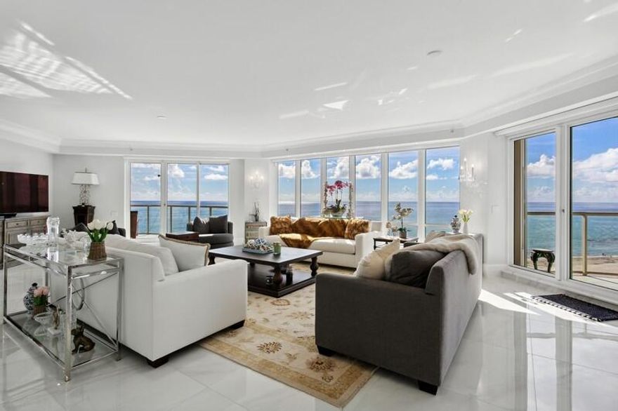 Welcome home to this spectacular direct oceanfront residence with all the bells and whistles, in the highly desirable Oasis building on Singer Island. This residence consists of the entire 9th floor with private elevator and entry and 360 degree of sweeping views of the ocean and intracoastal. This residence has been completely renovated and updated to the highest standards including: all high-end appliances and fixtures, brand new HVAC and water heater, new balcony floors, electrical blinds by Sarah Lopez Interiors (which alone cost about 74k), new kitchen, new bathrooms, new sheet-rock and paint throughout. The flooring throughout is 30x30 light marbling design porcelain tiles.

Oasis has a private beach, saltwater pool, new renovated common areas, tennis court, underground parking.