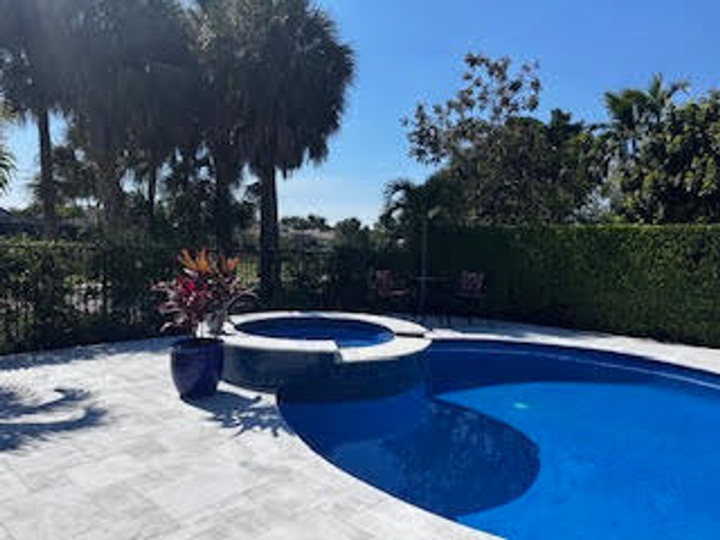 Photo of 2941 Twin Oaks Way, Wellington, FL 33414 (MLS # B26005867)