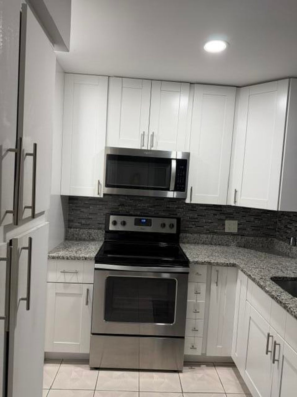 Photo of 628 N Sea Pine Way #A2, Greenacres, FL 33415 (MLS # B26027658)