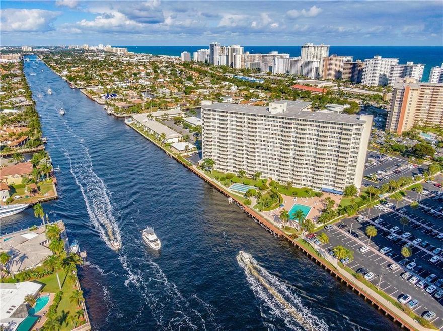 Enjoy breathtaking Intracoastal and city views morning and night—including glowing sunsets to sparkling skyline lights after dark. Watch the daily boat parade from your private balcony while feeling the coastal breezes. This fully furnished, beautifully updated 2BR/2BA offers luxury finishes, added closet storage, electric blinds, and peace of mind with newer A/C, water heater, appliances, and fixtures. Laundry is just outside your door. Community boat dock, easy pick-up/drop-off. In a well-maintained 55+ building (no pets, no leasing, $90K min income), just a few short blocks to the beach and walk to dining and shops. Plus, the association owns the land, which adds long-term peace of mind. Don’t miss your opportunity to experience these views in person—schedule your private showing today!