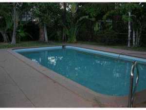 CHARMING POOL HOME! SPACIOUS 3/2 HAS TERRAZZO FLOORS THRUOUT LIVING AREAS. NEW CARPETING IN BEDROOMS. LARGE FAMILY ROOM WITH BUILT-INS. ALSO HAS DINING ROOM AND LIVING ROOM. SPACIOUS KITCHEN HAS STOVE TOP THAT USES NATURAL GAS. LAUNDRY ROOM WITH FULL SIZE WASHER/DRYER. DRYER USES NATURAL GAS. LARGE FENCED YARD PERFECT FOR PETS. OWNER IS PET FRIENDLY! POOL MAINTENANCE INCLUDED IN RENT. LAWN MAINTENANCE INCLUDED IN RENT. NO HOA!