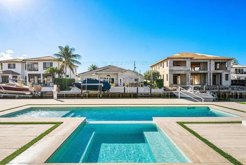 Tiny photo for 750 NE 69th Street, Boca Raton, FL 33487 (MLS # R11156884)