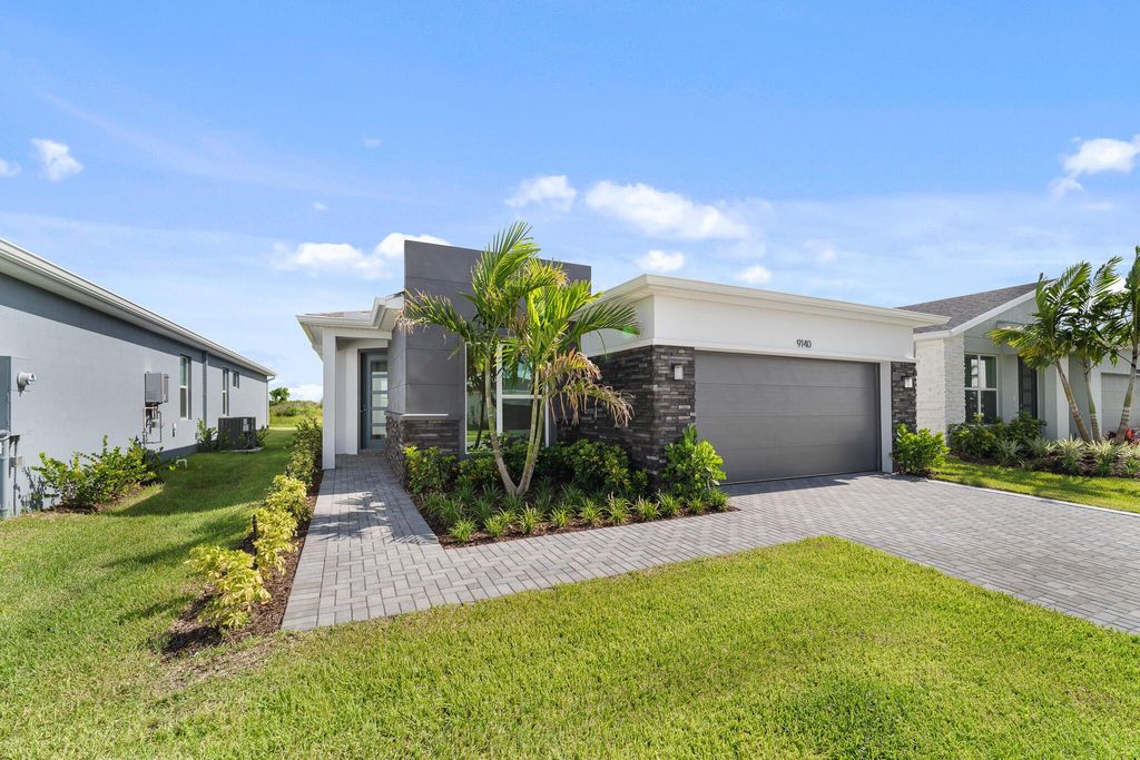 Photo of 9140 SW Remy Lane, Port Saint Lucie, FL 34987 (MLS # R11009326)