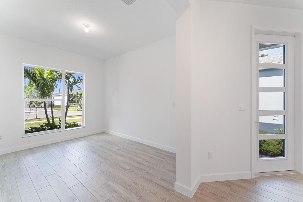 Photo of 9140 SW Remy Lane, Port Saint Lucie, FL 34987 (MLS # R11009326)