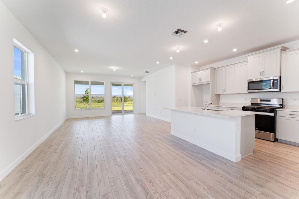 Photo of 9140 SW Remy Lane, Port Saint Lucie, FL 34987 (MLS # R11009326)