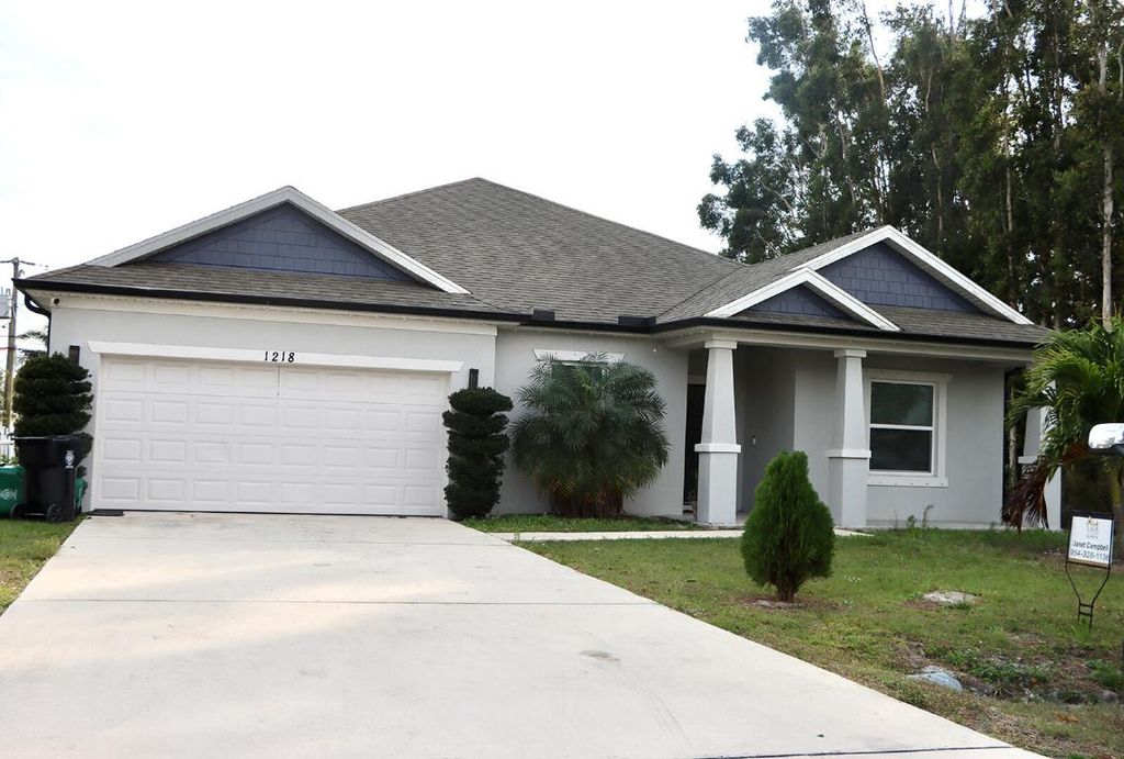 Photo of 1218 SW Parma Avenue, Port Saint Lucie, FL 34953 (MLS # R11126098)