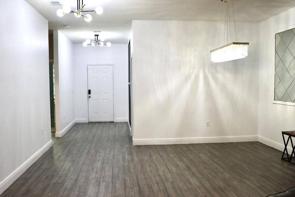 Photo of 1218 SW Parma Avenue, Port Saint Lucie, FL 34953 (MLS # R11126098)