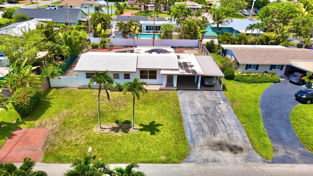 Photo of 470 NE 45th Street, Boca Raton, FL 33431 (MLS # B26043529)