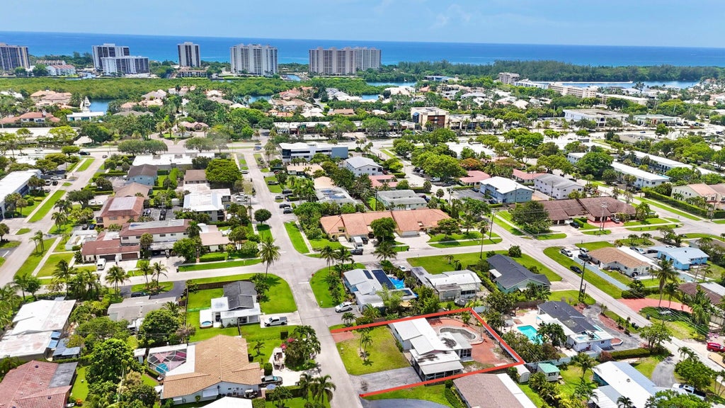 Photo of 470 NE 45th Street, Boca Raton, FL 33431 (MLS # B26043529)