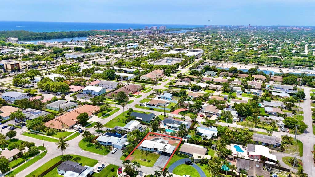 Photo of 470 NE 45th Street, Boca Raton, FL 33431 (MLS # B26043529)