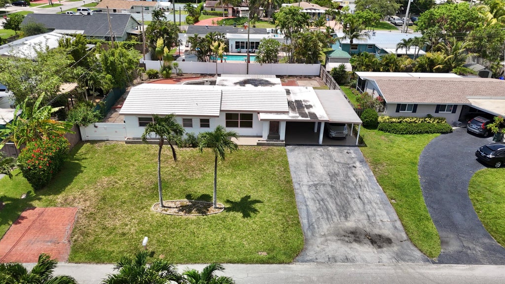 Photo of 470 NE 45th Street, Boca Raton, FL 33431 (MLS # B26043529)