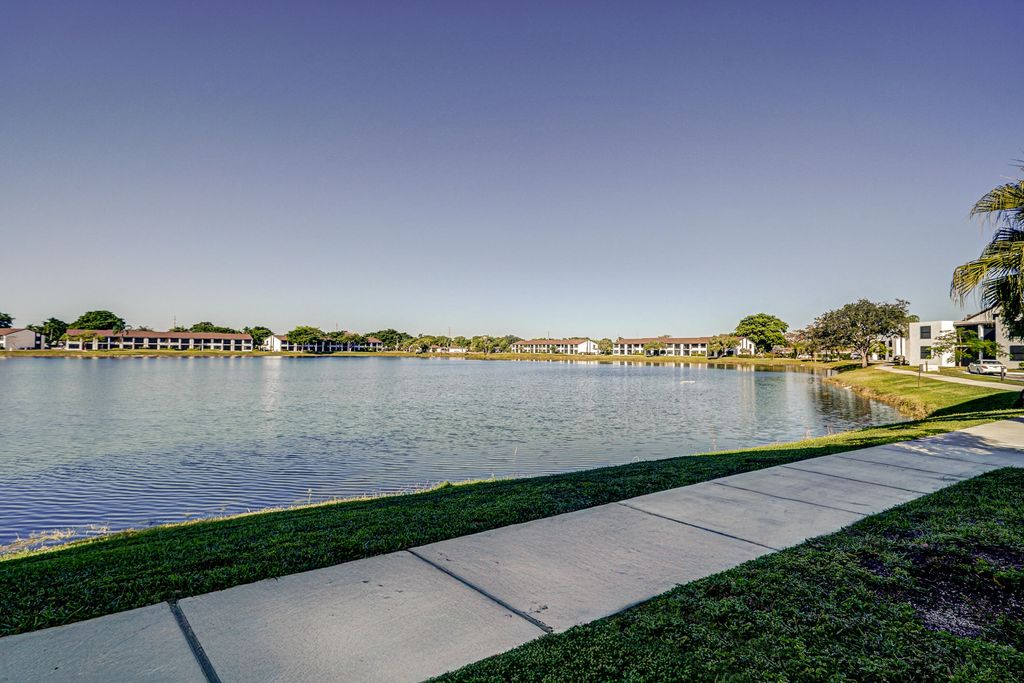 Photo of 212 Lake Pointe Drive #102, Oakland Park, FL 33309 (MLS # B26022051)