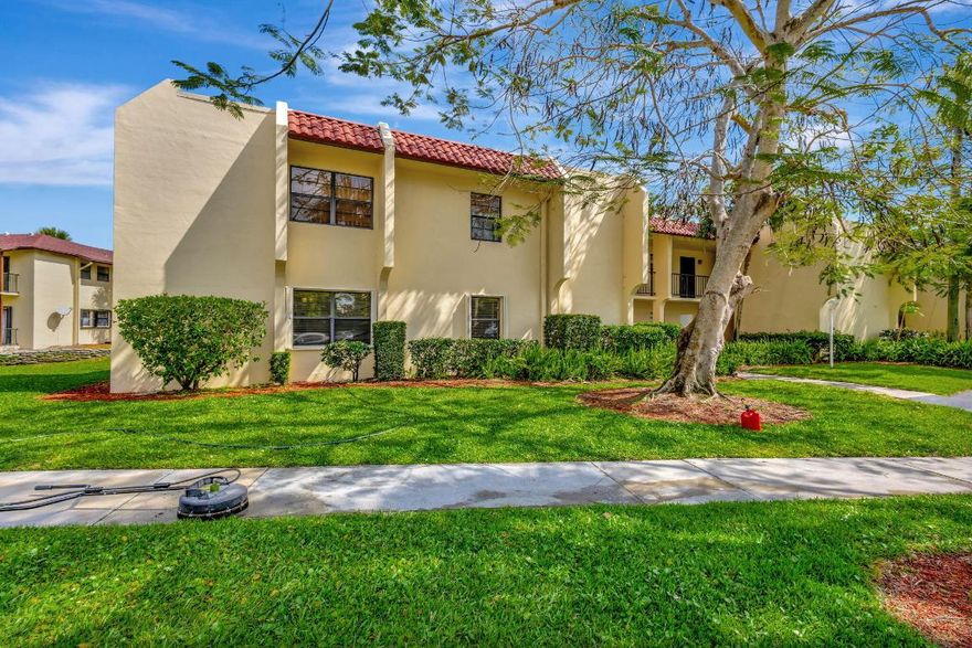 Owner will consider financcing with 25% down. Rare find, private first floor corner Unit in the Island House overlooking the pond. Tile throughout the unit. Remodeled kitchen with newer D/W and Range.. Master has a bump out area for an office or sitting area, also the shower in the Master bath was installed about 7 years ago. Sliders from LIving room and Master lead to screen tiled porches. Both porches have roll down shutters , the other windows have accordian shutters. Monthly maintenance fee includes water and sewer.