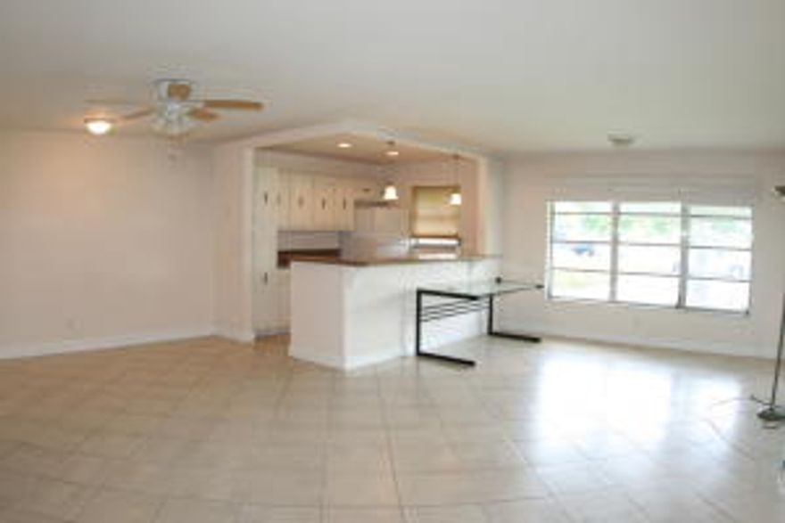 1BR/1.5BA villa located in a very active 55 plus community. You'll find tile flooring throughout, renovated kitchen w/granite counters. Just steps to the clubhouse. New A/C March/2013.  Villa has extra closet space and impact windows in Master bedroom. Florida living at its best in this very active 55+ community where you'll find many planned social activities, enjoy game night, traveling, large heated resort style pool and clubhouse and so much more.