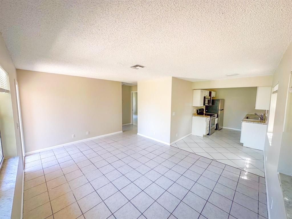 Photo of 4036 Luzon Avenue, Lake Worth Beach, FL 33461 (MLS # R10887972)