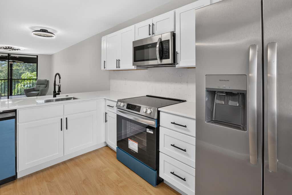 Photo of 6795 Huntington Lane #201, Delray Beach, FL 33446 (MLS # B26056524)