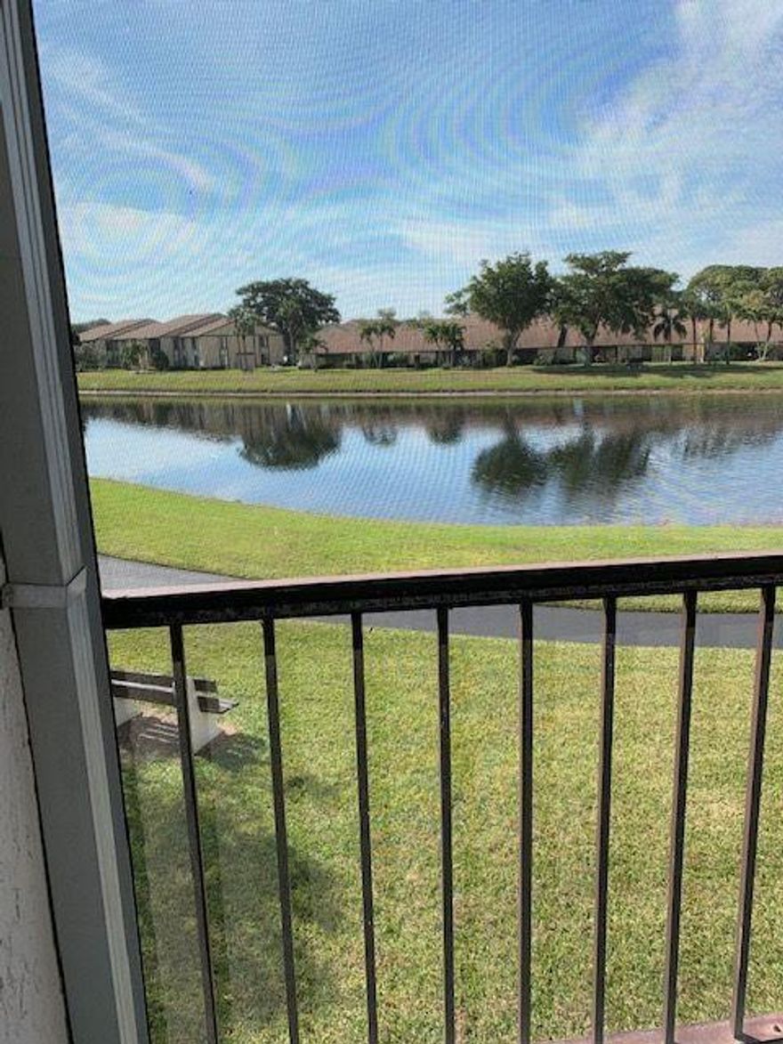 MUST SEE  THIS LOVELY 2/2,  BREATH TAKING LAKE VIEW IN THIS QUIET 55 + COMMUNITY OF PINE RIDGE.. FRESHLY PAINTED, NEW FLOORS, EXCELLENT NEIGHBORHOODWATER AND BASIC CABLE INCLUDE.               WASHER AND DRYER IN UNIT