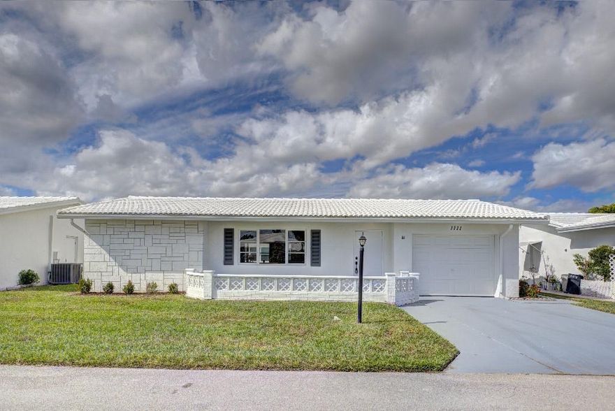 MUST SEE! Everything has been updated in this 2 bedroom 2 bathroom single-family home in sought after community. of 55+ Leisureville Community. The Master Suite has its own sitting room and office area and the kitchen has been opened up and has a sitting counter area.The community has low HOA fees and offers clubhouses, 3 pools and 9 hole golf course, a fitness centre and social activities.Close to restaurants and beach.