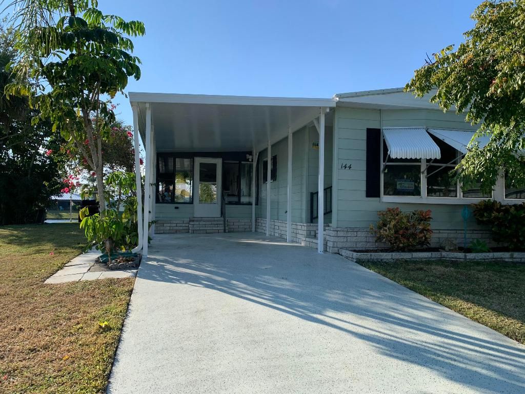 Photo of 144 Calle De Lagos, Fort Pierce, FL 34951 (MLS # R11140121)
