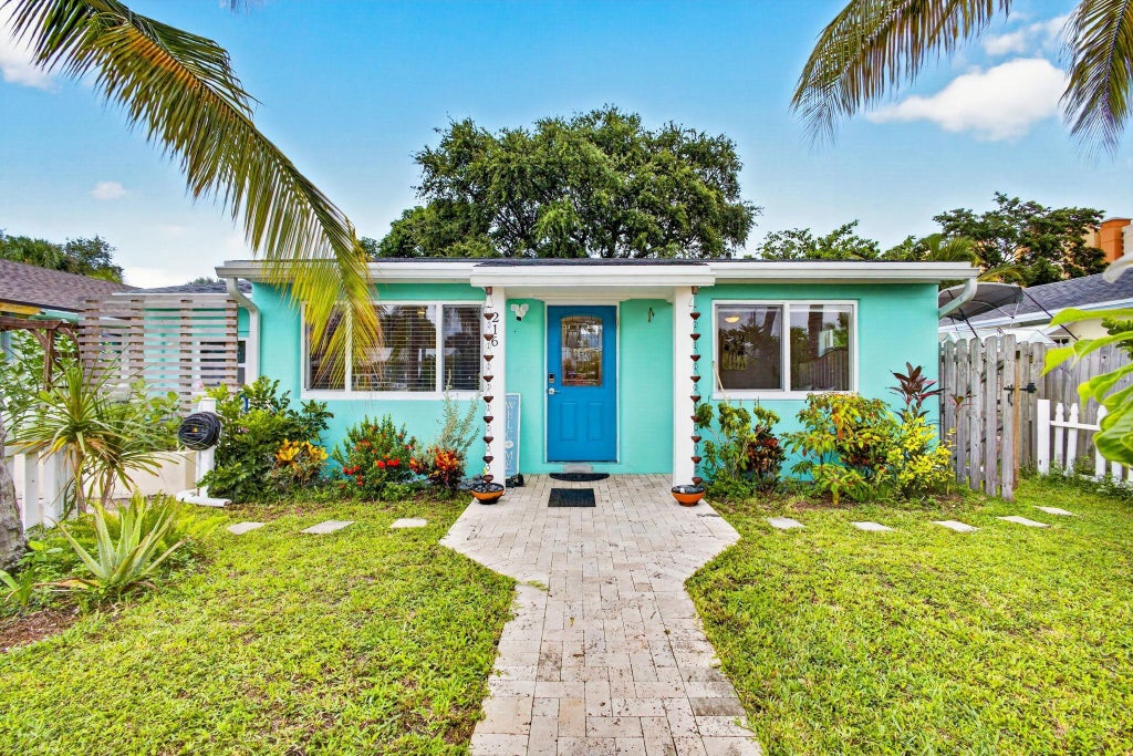 Photo of 216 E 24TH Street, Riviera Beach, FL 33404 (MLS # B26074066)