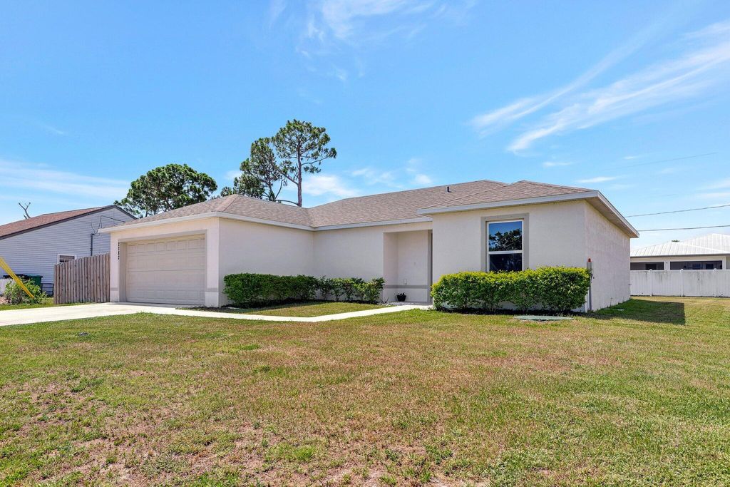 Photo of 2282 SE Melaleuca Boulevard, Port Saint Lucie, FL 34952 (MLS # R10991112)