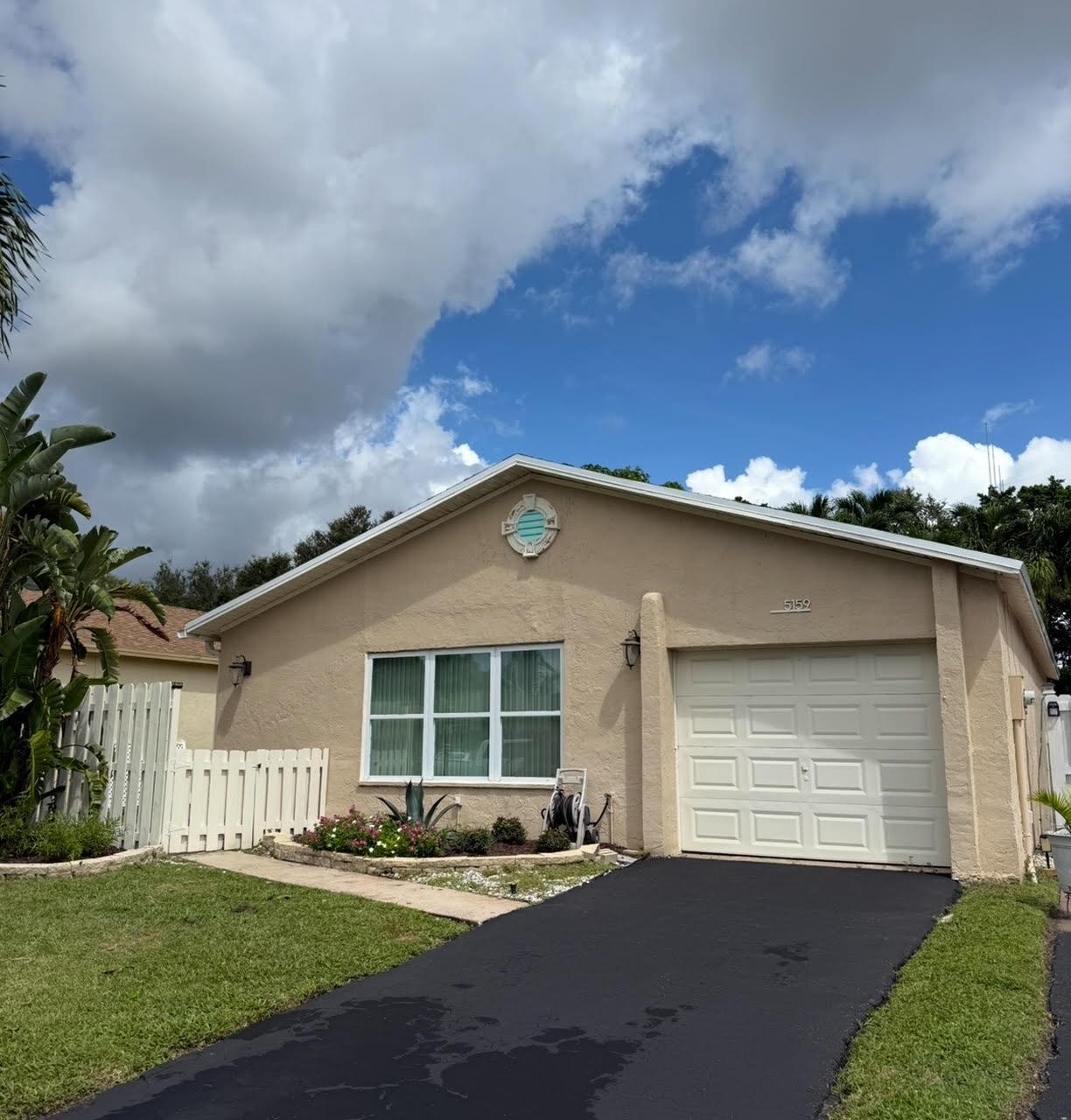 2BR 2BA charmer in popular Boynton Beach HOPA 55+ community. Garage, screened porch, tropical oasis private lot. Roof 2025! Kitchen cabinets 2025! Entire interior fresh paint. New range, a/c 2021, impact glass front window, accordion shutters complete. LOW HOA $172. mo., includes cable, internet and sprinklers from lake. Lovely boutique community of only 238 homes, with plenty of green spaces, lake front pool and walking promenades, fishing, pickleball/tennis courts, gamerooms, boat ramp. Easy going, friendly neighborhood has few restrictions; bring your pets, motorcycles, pick up trucks. Convenient to international airports, highways, shops, dining, 6 miles to beach!