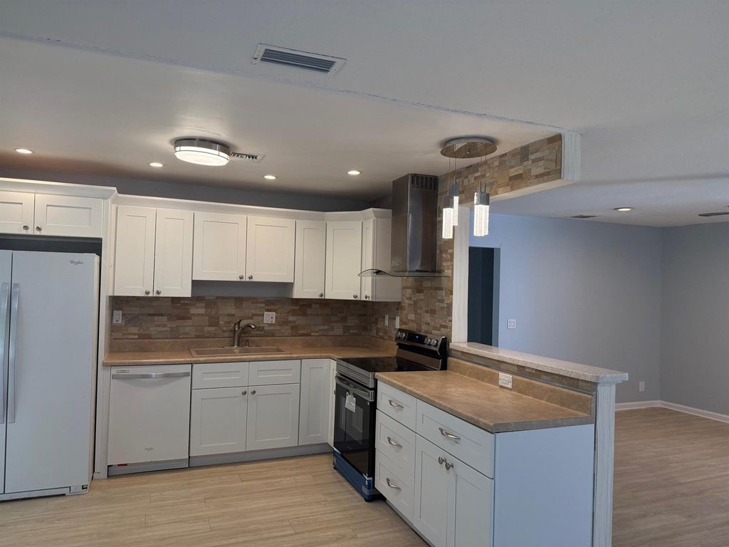 Photo of 5159 Mirror Lakes Boulevard, Boynton Beach, FL 33472 (MLS # R11121711)