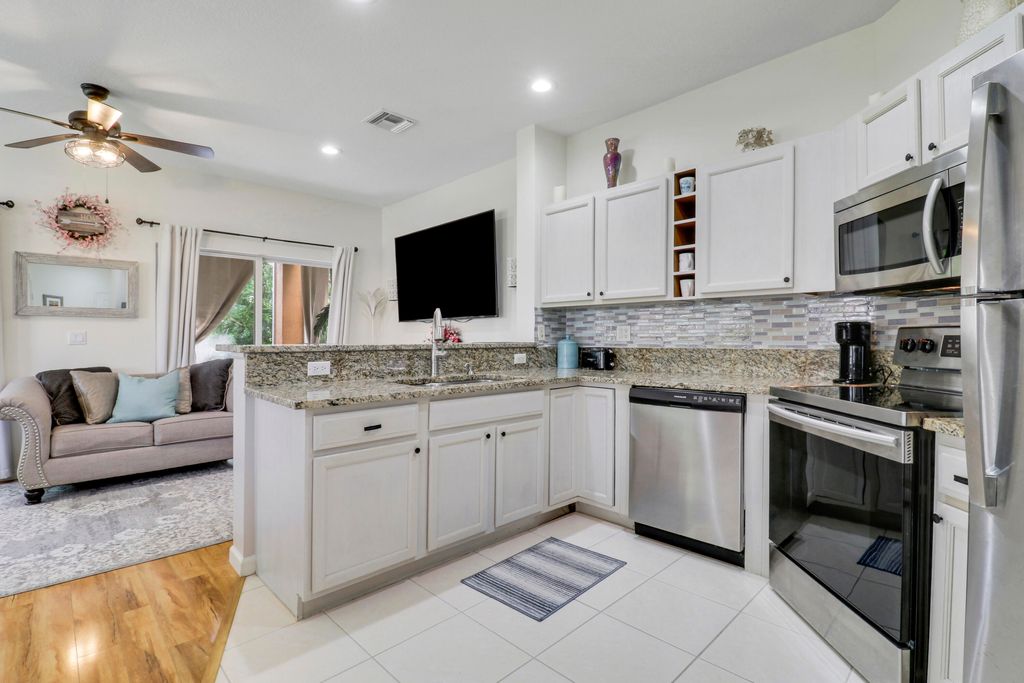 Photo of 8301 Mulligan Circle #3211, Port Saint Lucie, FL 34986 (MLS # B26017450)