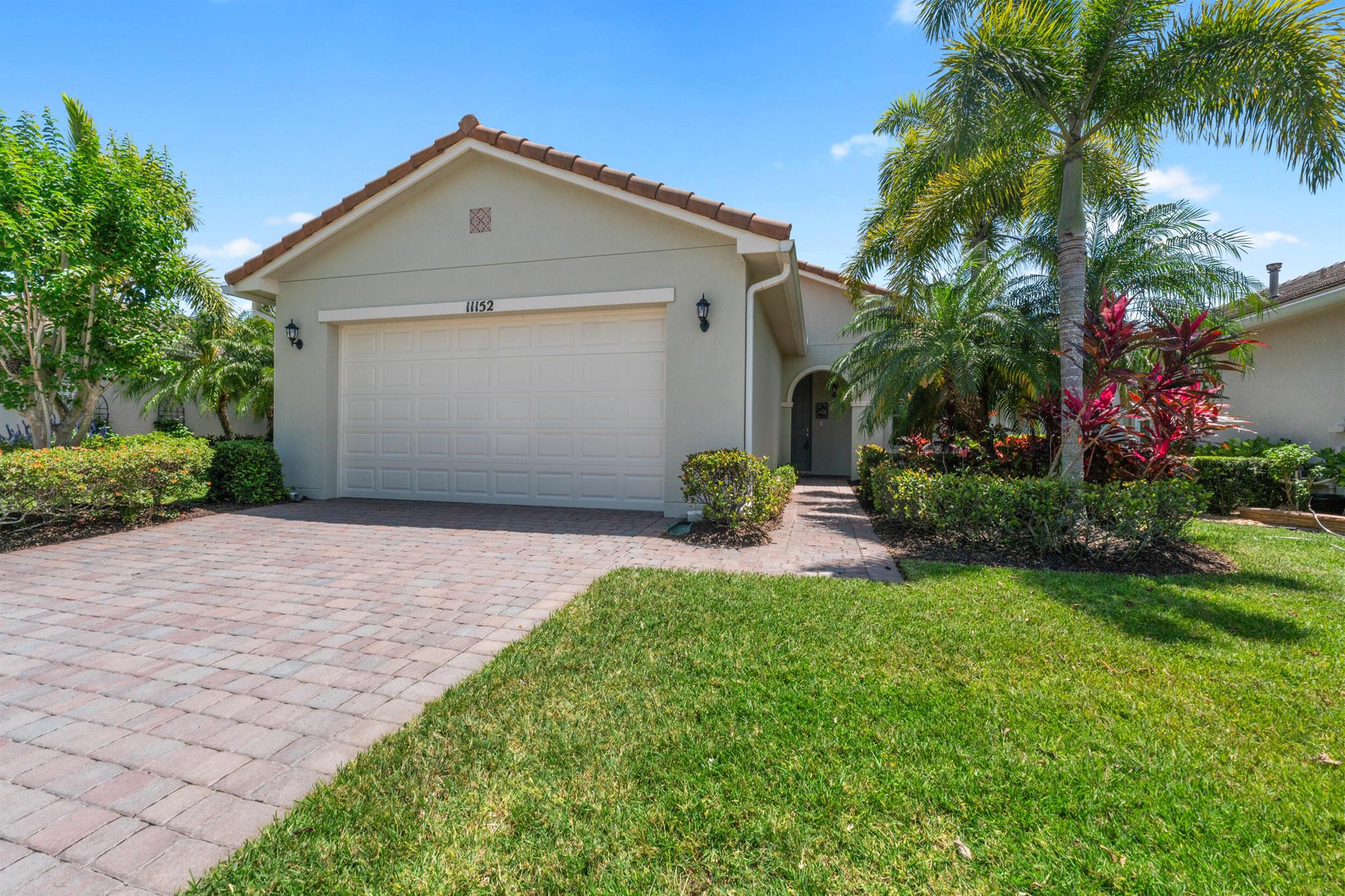 RARE opportunity to own a single family home with an exclusive preserve view. Only a handful of homes have this privacy! This charming 2 bedroom, 2 bath home features a large family room and an additional den. Enjoy this active gated neighborhood in Port St. Lucie with resort style amenities. Join an activity or club ; or just enjoy strolling down the sidewalk in your beautifully landscaped neighborhood. You are minutes to shopping and restaurants in the wonderful community of Tradition. Golf and beaches are close by also! Don't miss out on this PSL gem!