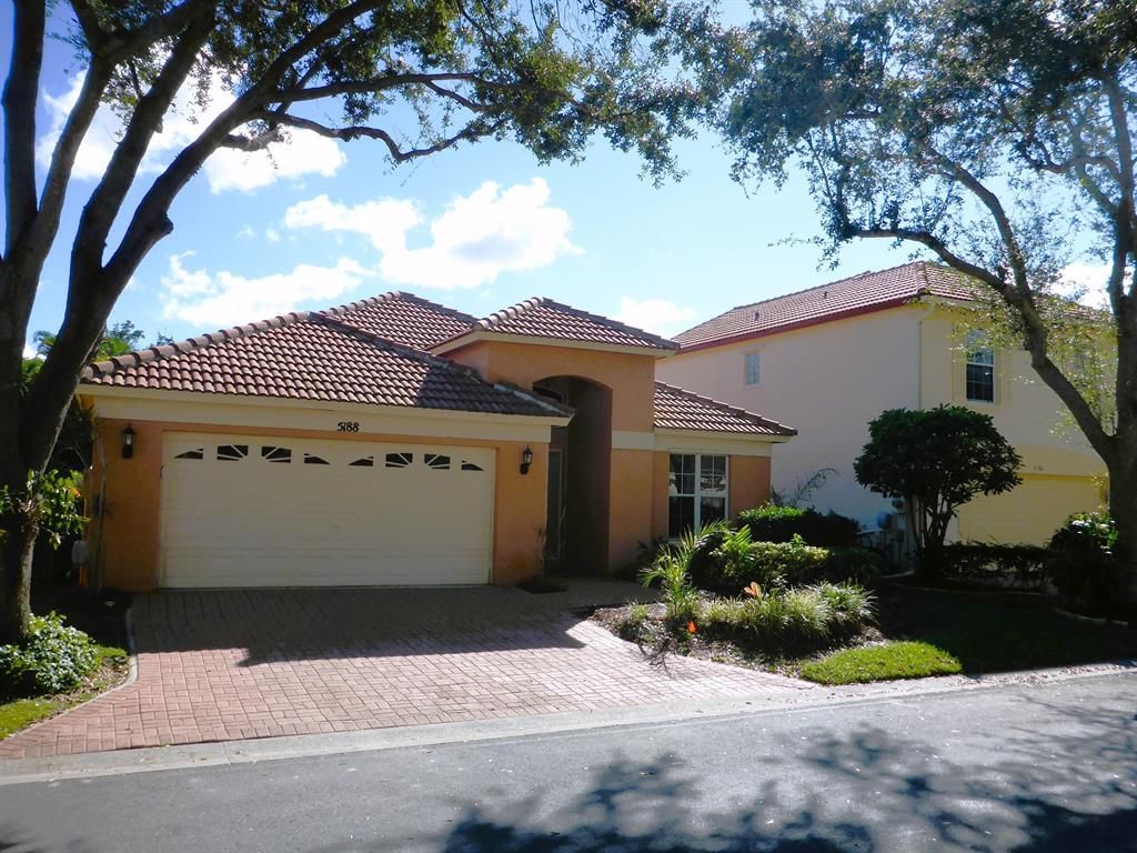 Photo of 5188 Elpine Way, Riviera Beach, FL 33418 (MLS # R10841978)