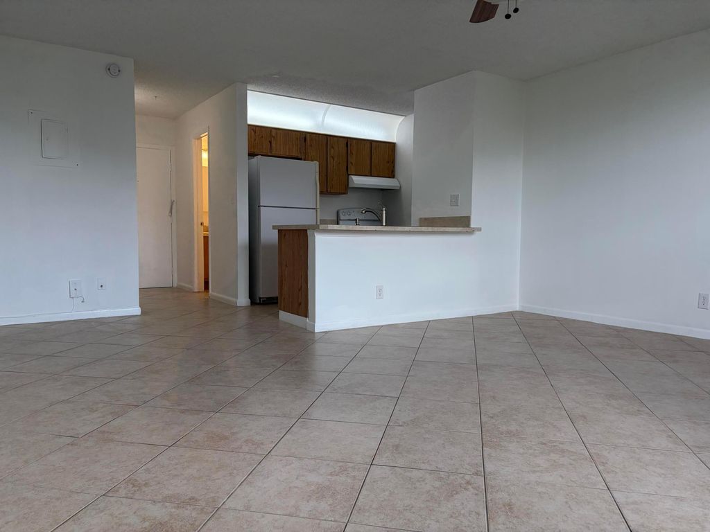 Photo of 2771 Riverside Drive #412-a, Coral Springs, FL 33065 (MLS # B26030135)