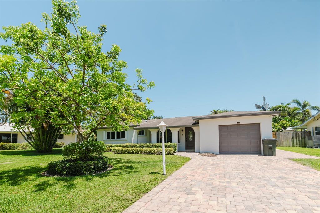 Photo of 4998 NW 3rd Terrace, Boca Raton, FL 33431 (MLS # F10505565)