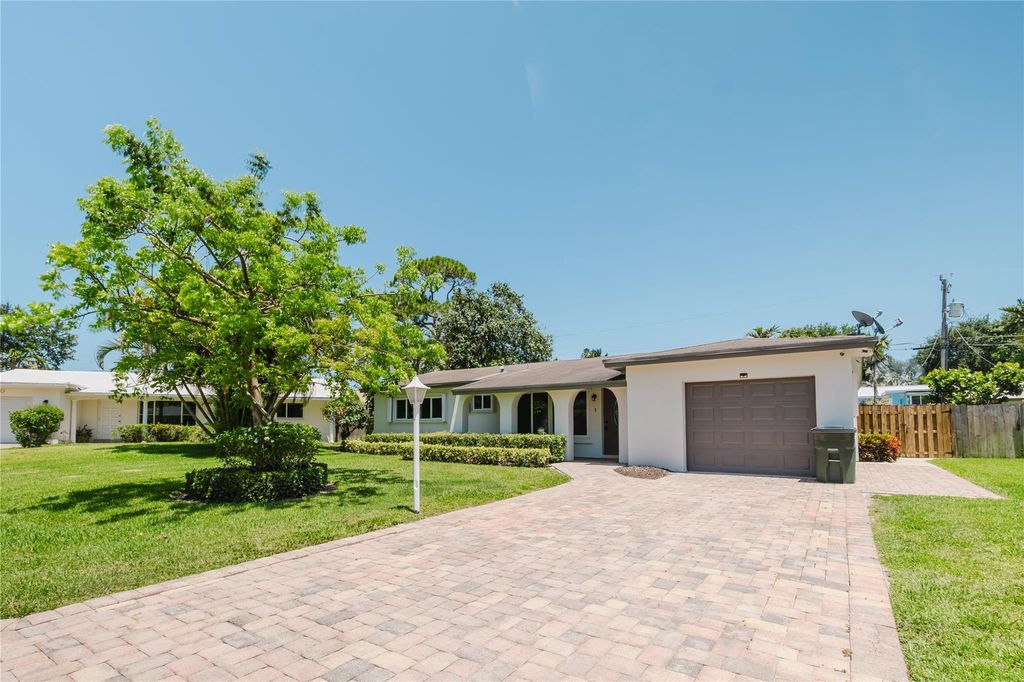 Photo of 4998 NW 3rd Terrace, Boca Raton, FL 33431 (MLS # F10505565)