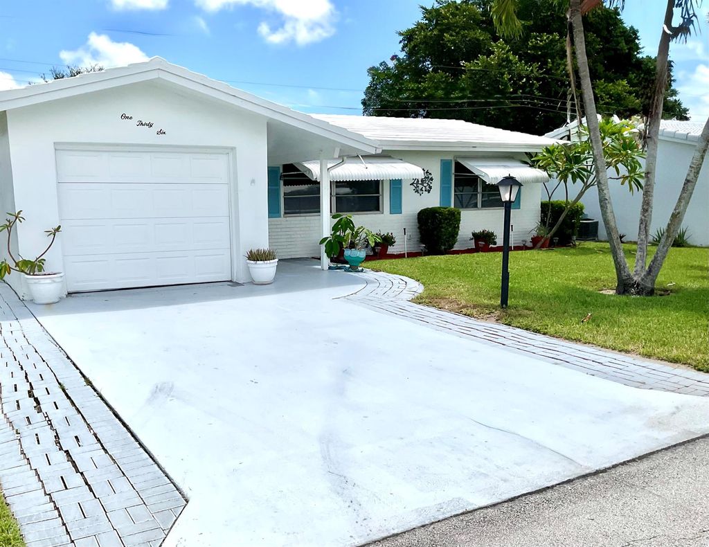 Photo of 136 NW 10th Court, Boynton Beach, FL 33426 (MLS # R11113719)